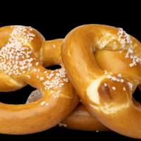 Bavarian Pretzels · Warm, soft pretzels with a crunchy shell, served with house cheese dip.