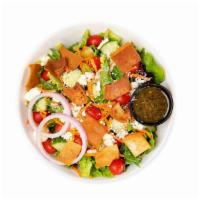 Feta Fattoush Salad · Field greens, tomato, cucumber, red onion, carrots, pita chips, feta, fattoush dressing.