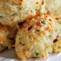 Bacon & Cheddar Biscuit · Our Bacon & Cheddar Biscuits are inspired by a 100 year old recipe from a women's auxillary ...