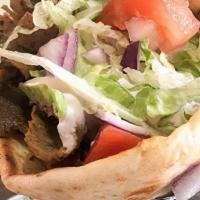 Pita · A large pita filled with your favorite Protein, Sauce and Toppings.