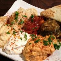 Mezze Plate (Pick 3) · Most popular. Your choice of any three appetizers.
