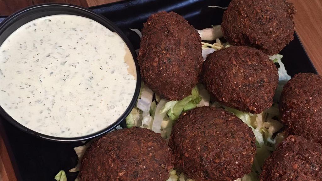 Falafel · Most popular. In House Ground Garbanzo beans mixed with fresh parsley, cilantro, onions and Mediterranean spices.
