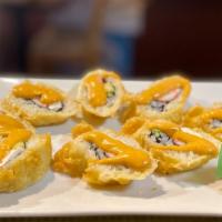 Spicy Crunchy California · Crab, avocado, and cream cheese inside. The roll is deep friend and then topped with spicy m...