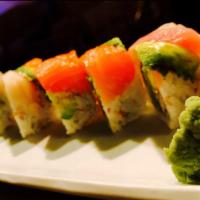 Rainbow (8 Pc) · Crab stick, cucumber and avocado inside topped with raw fish.