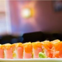 Iowa Roll · Tempura shrimp, cucumber, cream cheese inside topped with sliced lemons and salmon on top. R...
