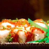Halloween Roll · Spicy tuna inside. Cuttle fish and spicy sauce on top.