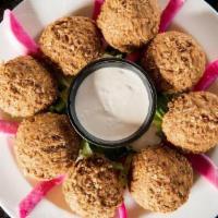 Falafel Platter · Eight pieces. A mixture of ground chickpeas, vegetables, and deep fried with spices. Served ...