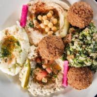 Combination Appetizer · A generous taste of baba ghanoush, hummus, tabouleh salad, potato salad, and falafel. Served...