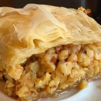 Baklava · A rich sweet pastry made of layers of film dough. Filled with chopped nuts and sweetened wit...