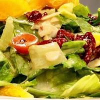 Mezze Salad · Dried cranberries, mandarin oranges, toasted almonds, tomatoes, and endives. Tossed with rom...