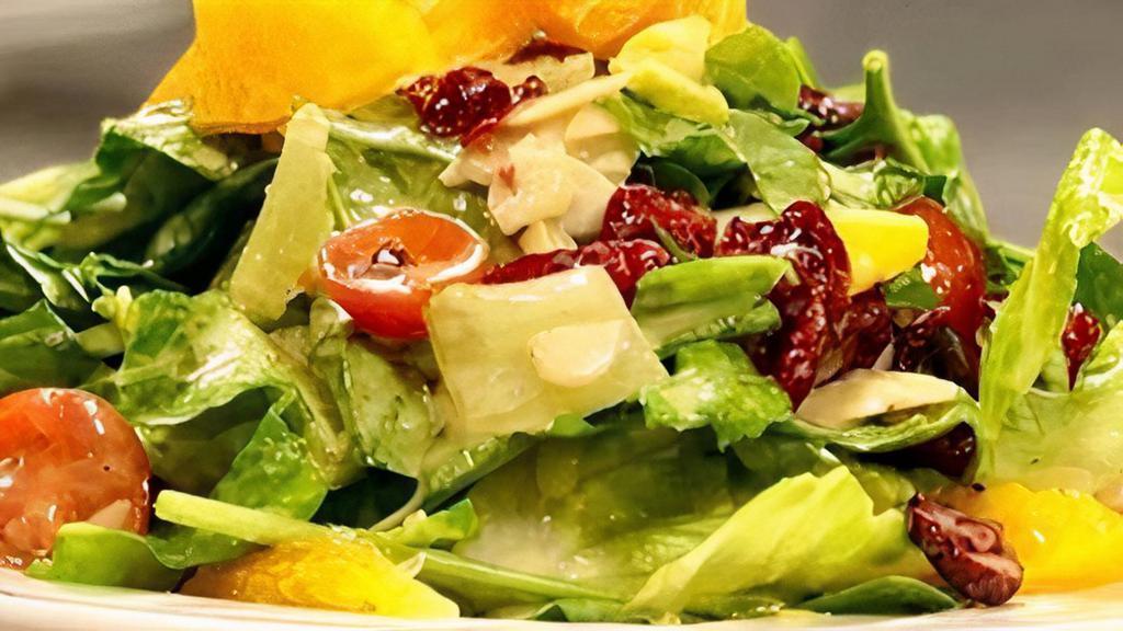 Mezze Salad · Dried cranberries, mandarin oranges, toasted almonds, tomatoes, and endives. Tossed with romaine in a fresh citrus vinaigrette.