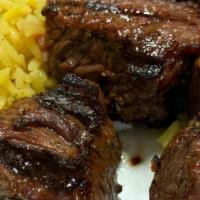 Beef Shish Kabob · Tender cubes of marinated sirloin seasoned and charcoal grilled to perfection. Cooked on a s...