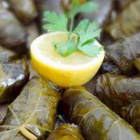 Grape Leaves · Fresh grape leaves hand stuffed with a delightful mixture of vegetables, and rice with authe...