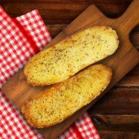 Large Garlic Bread · Soft & crunchy Audinno’s Bakery Italian bread topped with garlic butter, baked to perfection...