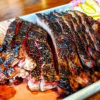 Classic Smoked Brisket · 1/2 lb. Texas-style Prime Angus Brisket seasoned in our special dry rub and smoked to perfec...
