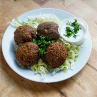 Falafel (4) · Seasoned ground chickpeas blended with fresh herbs and Mediterranean spices, served with tah...
