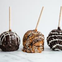Gourmet Apple · Offering Caramel dipped apples, covered in chocolate and then covered in chocolate chips and...