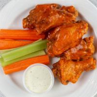 Wings · Tossed in your choice of homemade signature sauces; spicy buffalo, cheesy garlic, buffalo, s...