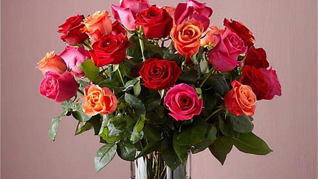 24 Mixed Rose Bouquet · Live happily with the Ever After Mixed Rose Bouquet. This arrangement features two dozen roses in three vibrant hues: orange, hot pink, and red. This trifecta will warm any space they're displayed in and any recipient's heart. Vase included.