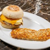 Eggy Sandwich · Eggs, Jon's natural bacon and Cheddar cheese served on Texas toast with hash browns.