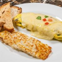 Veggie Omelette · Fresh mushroom, onion, Roma tomato, green bell pepper, baby spinach and Swiss cheese served ...