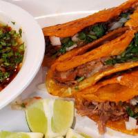 Birria Tacos · Traditional Recipe from Mexico City! Marinated Beef, Onion, Cilantro and Salsa Verde Served ...
