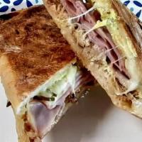 Special Cubano · New special sub, roasted pulled pork, mustard aioli, ham, pickles, swiss cheese on ciabatta ...