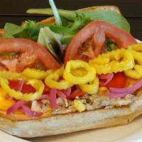 Jc'S Sub · Roasted chicken under cheddar with banana peppers, roasted red onions, roasted red peppers, ...