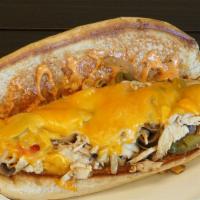 Chicken Philly · Roasted chicken under cheddar with grilled red peppers, green peppers, grilled onions, grill...