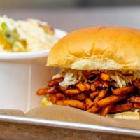 Pulled Squash Sandwich · Baked shredded squash with BBQ sauce served on a bun with pickles, coleslaw, and house sauce...