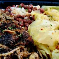 Signature Jerk Chicken Bowl  · Pulled Jerk Chicken, Red Beans and Rice & Cabbage