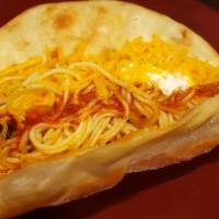 Spaghetti Taco · Deep Fried Flour Tortilla Dusted in Parmesan Cheese, Filled with Spaghetti & Meat Sauce, Top...