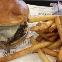 Mushroom Burger · House-made steak burger, roasted mushrooms, Swiss cheese, caramelized onions, whole grain mu...