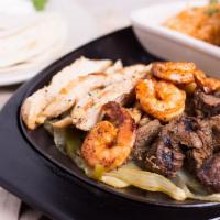 Mixed Grill · Steak & chicken fajitas with shrimp sauteed in chipotle butter