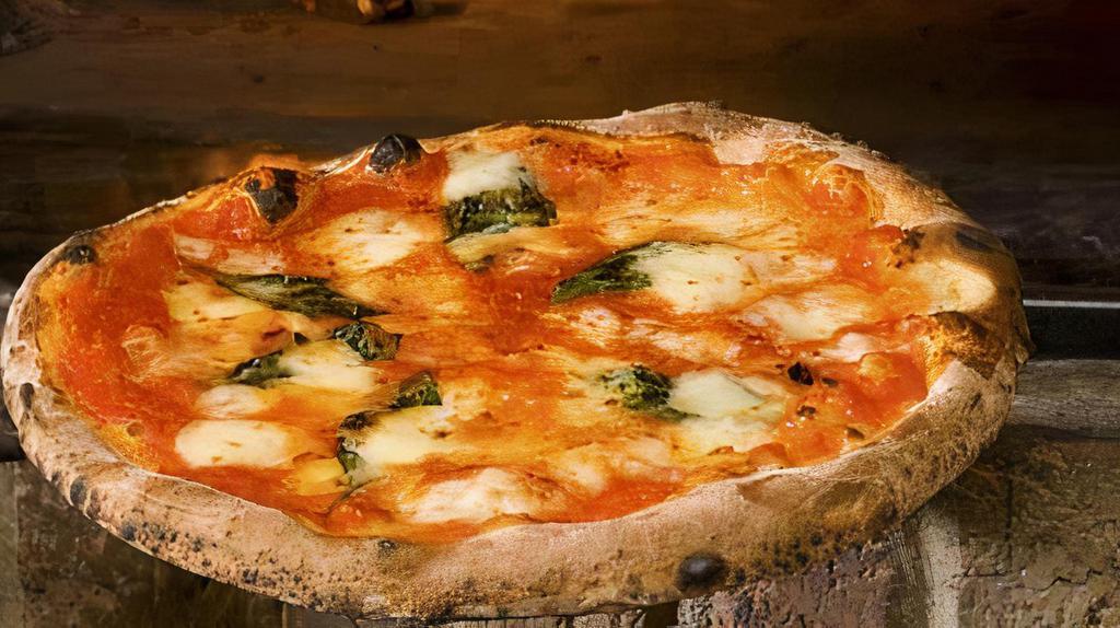 Margherita Pizza · Italian tomato sauce, fresh mozzarella , fresh basil & olive oil.