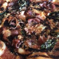 Margherita Fino Pizza · Classic margherita with prosciutto ham, balsamic reduction.