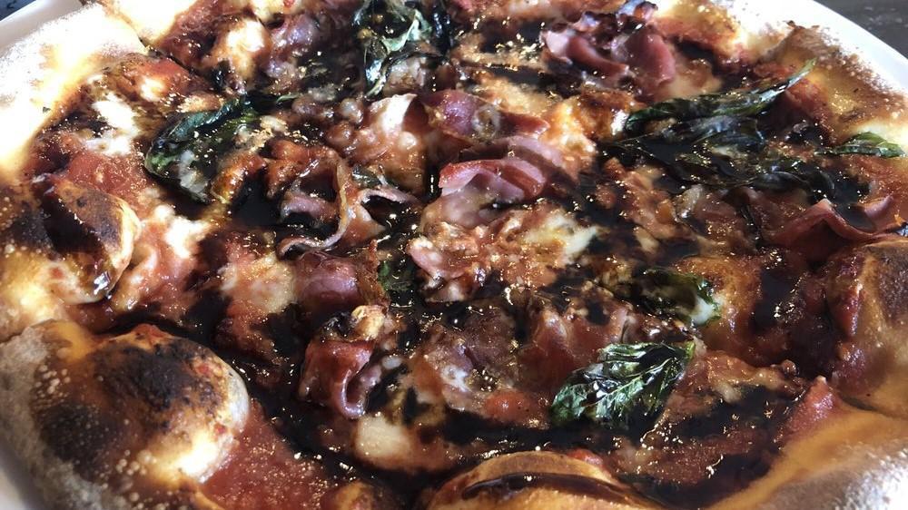 Margherita Fino Pizza · Classic margherita with prosciutto ham, balsamic reduction.