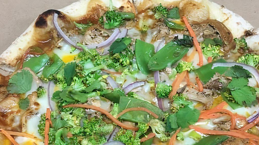 Thai Chicken Pizza · Our thai sauce, fire roasted chicken, red pepper, onion and fresh basil topped with crunchy bean sprouts