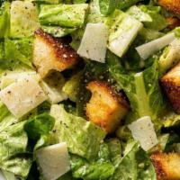 Caesar Salad · Romaine lettuce, parmesan cheese, tomatoes, red onions and croutons.