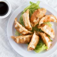 A4 - Dumplings (8 Pcs.) · Chicken, pork and cabbage in wonton wrap.