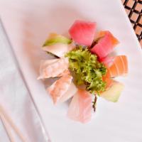 Rainbow Special Roll · California roll topped with tuna, salmon, shrimp, red snapper and white tuna.