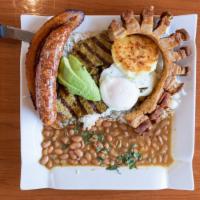 Bandeja Paisa · Grilled top sirloin with rice, crackling, fried egg, beans, Colombian sausage, corn cake, av...