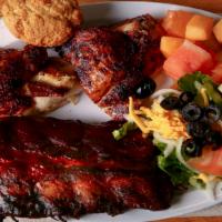 Chicken & Ribs Combo · 1/2 hickory roasted chicken and 1/2 slab of hickory smoked bbq ribs.