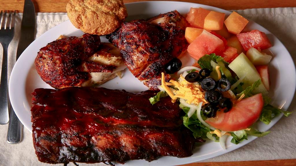 Chicken & Ribs Combo · 1/2 hickory roasted chicken and 1/2 slab of hickory smoked bbq ribs.