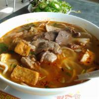 Bun Bo Hue · Hot and spicy rice noodle soup with beef brisket and pork hock