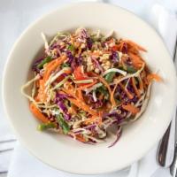 Thai Salad · Julienne carrot, red cabbage, green cabbage, tomatoes, green beans and chopped peanuts tosse...