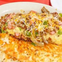 Oklahoma Omelette · Bacon, pork sausage, shredded beef and ham with fresh green peppers, onions and Cheddar chee...