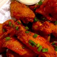 Traditional Wings · *10pc Traditional style wings tossed in your choice of sauce.