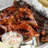 Chicken & Ribs Combo · 1/2 slab bbq ribs & 1/2 rotisserie chicken; Served with garlic bread, coleslaw and choice of...