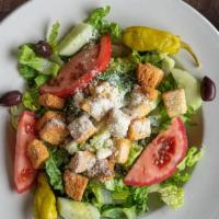 Caesar Salad · Tomato, Cucumber, Olives & Pepperoncini, Croutons, Parmesan. Caesar dressing. Served with wa...